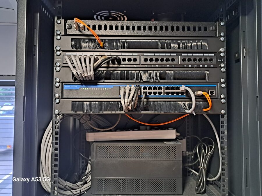 Structured cabling rack with patch panels and dressed copper