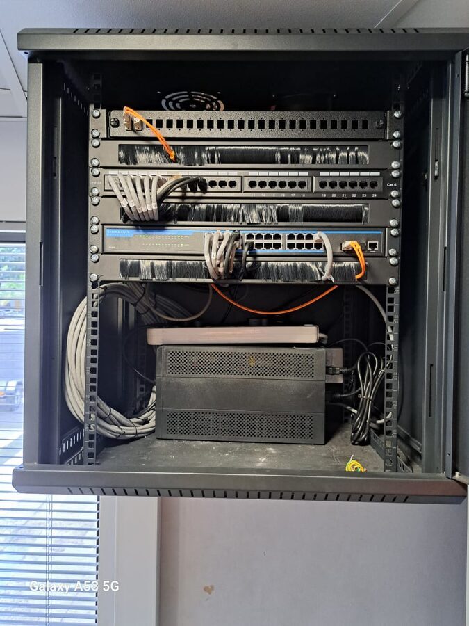 Patch panels and network switches in a server cabinet