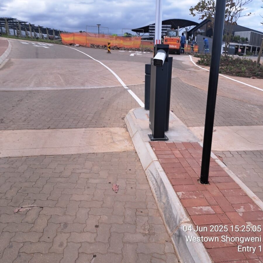 Surveillance camera covering a paved site entrance