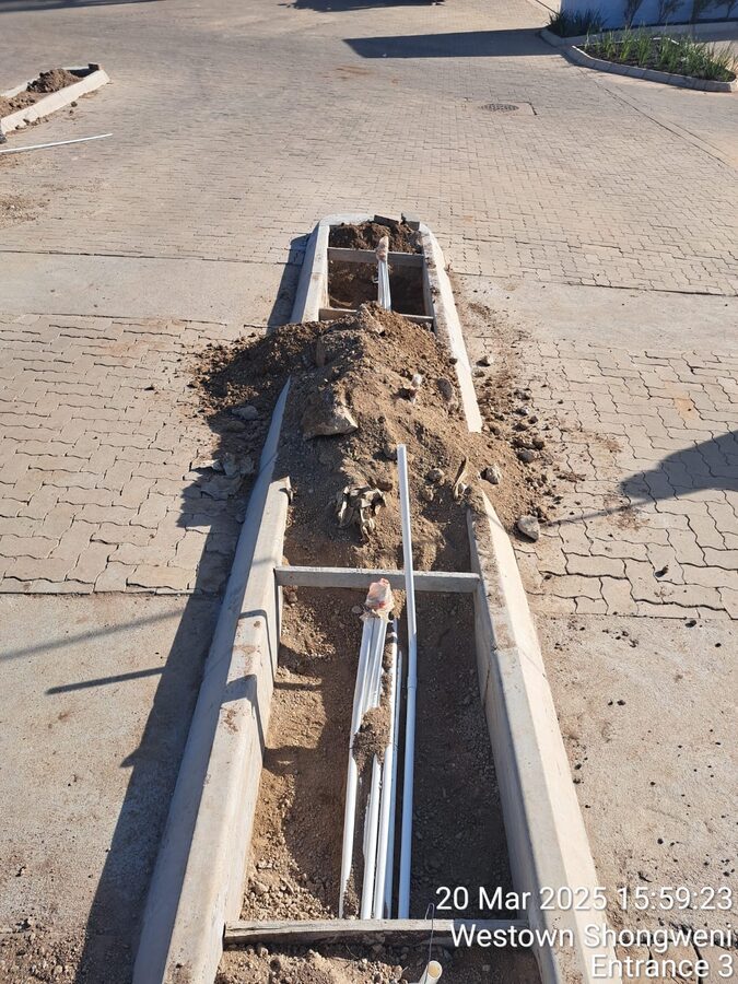 Multiple conduits laid in a trench before reinstatement