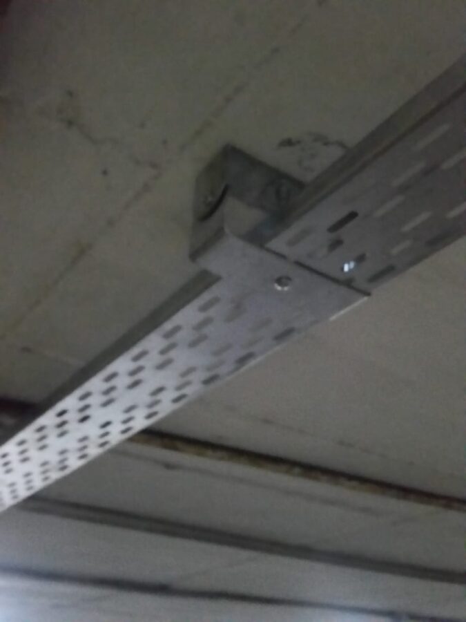 Galvanised cable ladder carrying network and power runs