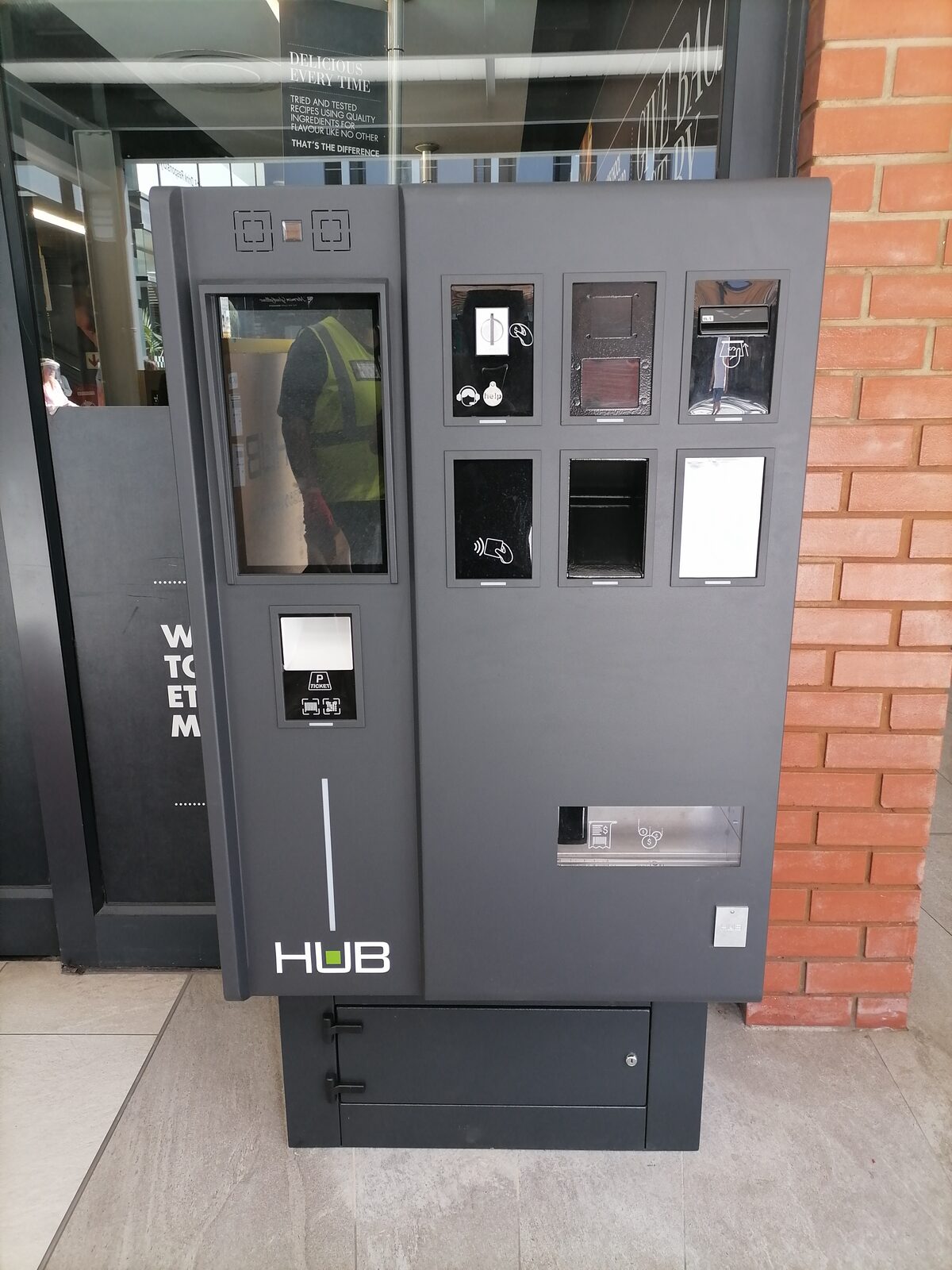 Paid-parking pay station installed in a parkade