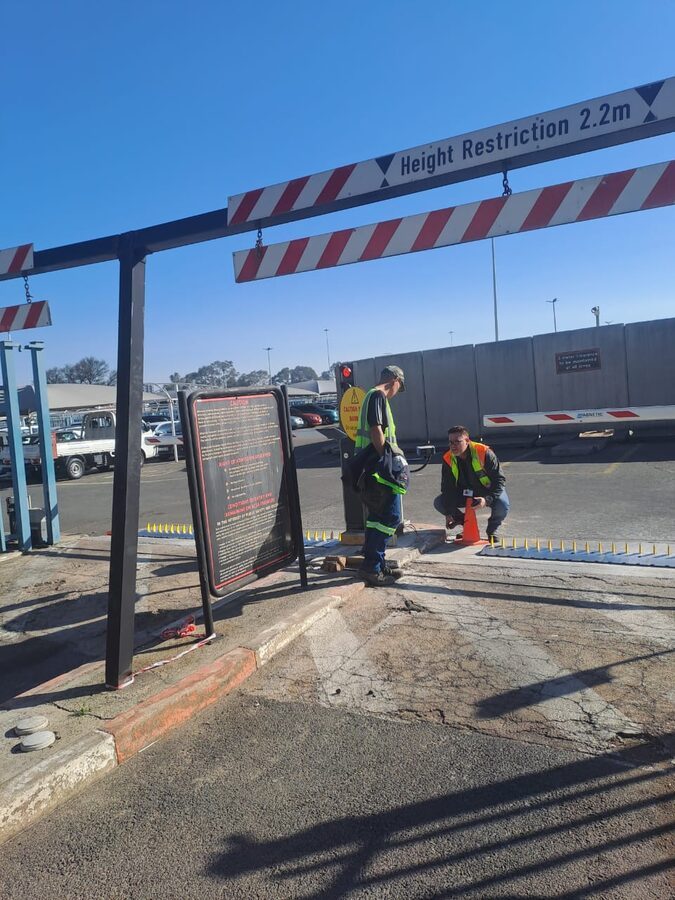 Boom-gate lane installation at a parking entrance